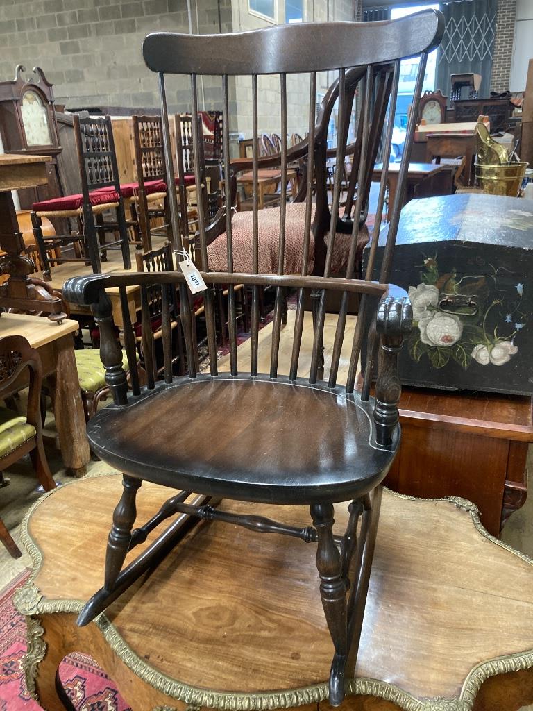 A Windsor beech rocking chair, width 59cm, depth 45cm, height 106cm